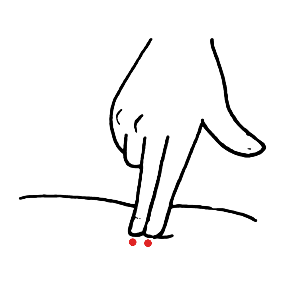 人さし指と中指の腹でツボを押すイラスト
